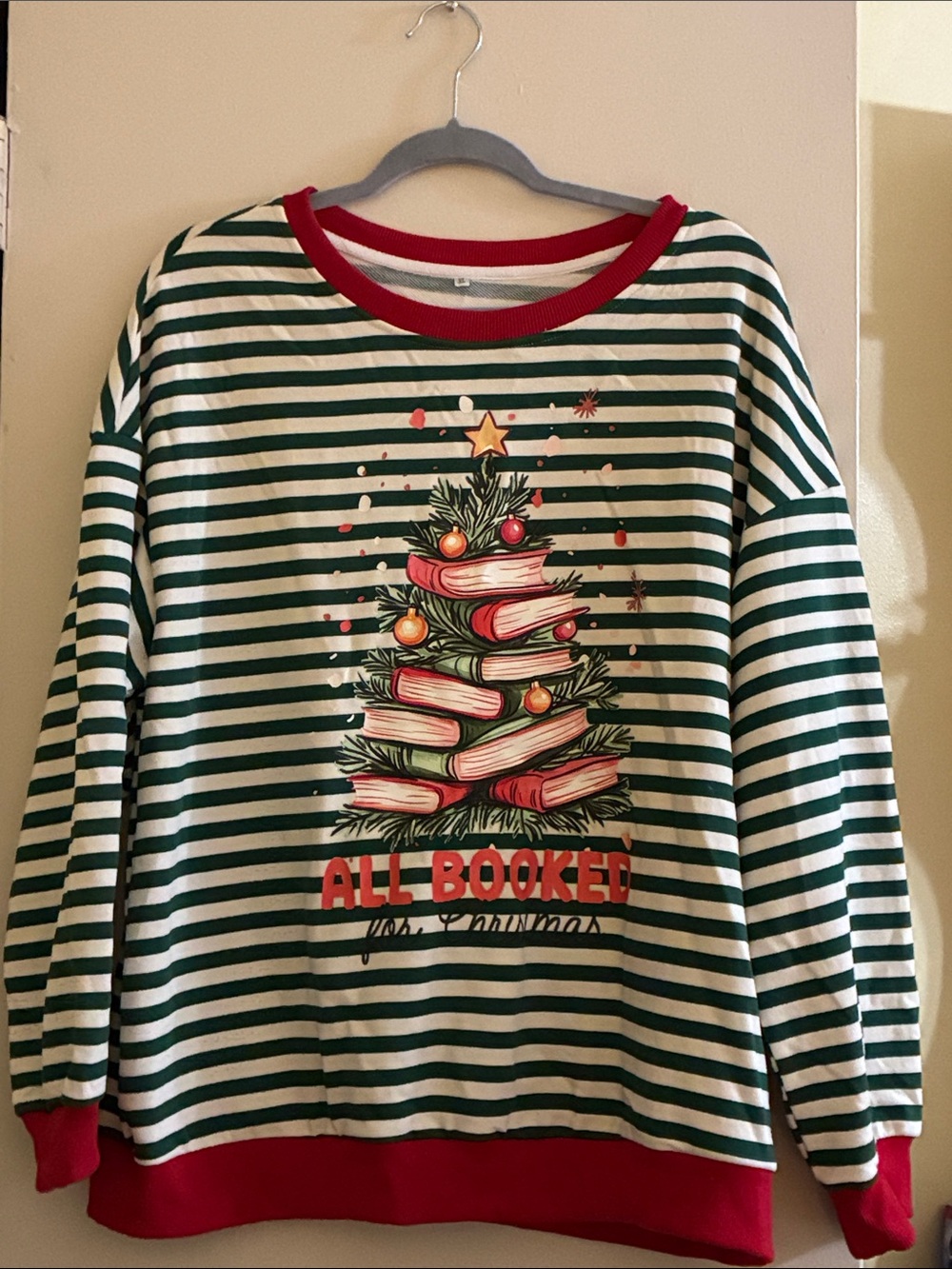 “ALL BOOKED FOR CHRISTMAS” SWEATSHIRT